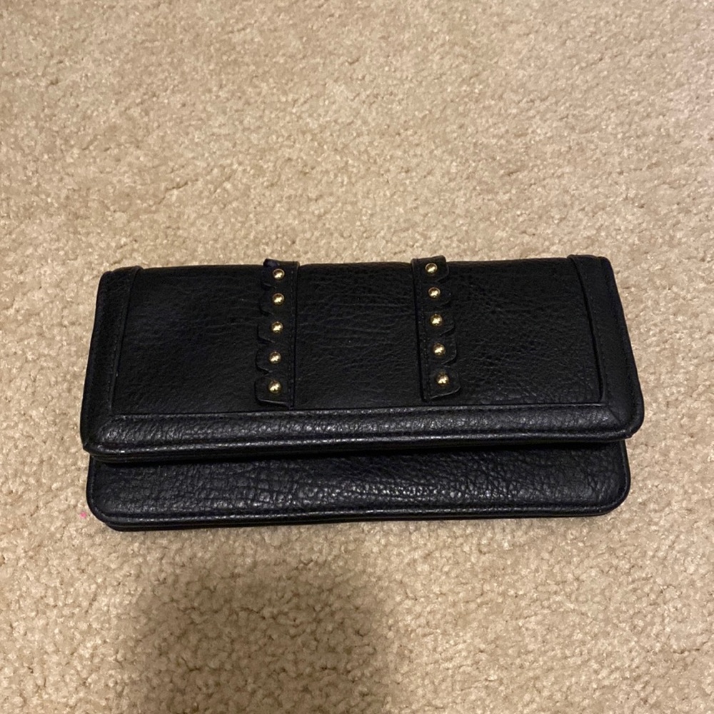 Jessica Simpson black wallet with gold studs. Good condition. Rarely used